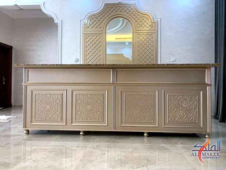 Painted counter with CNC-grooved Islamic geometric door panels and a CNC lattice arch mirror frame, by Al Malek Carpentry